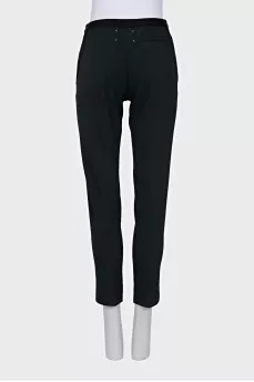 Green tapered trousers