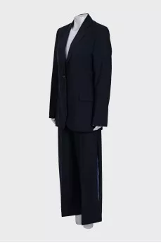 Suit of trousers with ties and a jacket