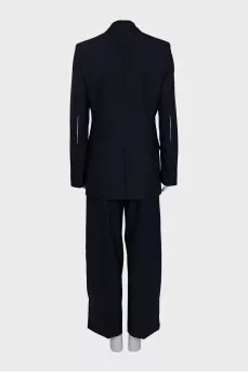 Suit of trousers with ties and a jacket