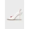 Patent leather sandals in white
