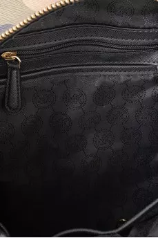 Leather backpack in military print