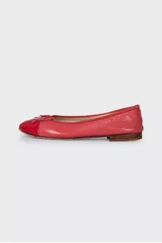 Pink ballet flats with embroidered logo