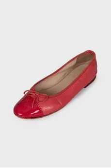 Pink ballet flats with embroidered logo