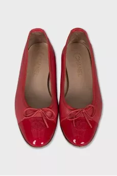 Pink ballet flats with embroidered logo