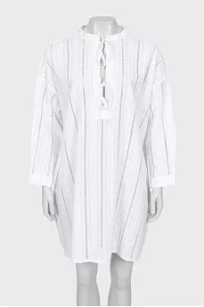 Dress with ties and perforations
