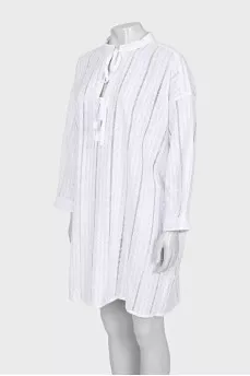 Dress with ties and perforations