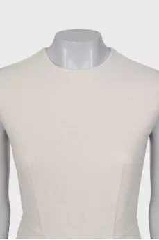 White dress with golden pin