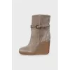 Suede ankle boots with strap