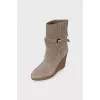 Suede ankle boots with strap