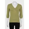 Green button down sweater