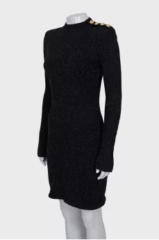 Black dress with gold buttons