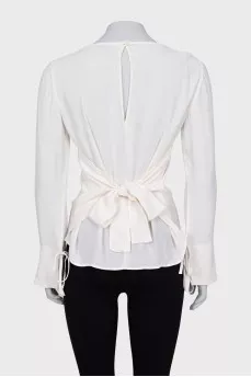 Blouse with tie cuffs