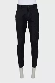 Men's trousers with a branded patch