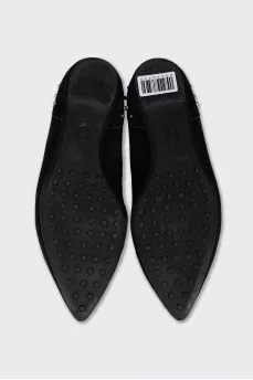 Black ballet flats with gold trim