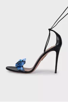 Leather sandals decorated with butterflies