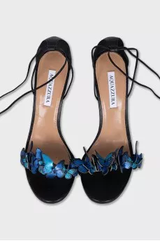 Leather sandals decorated with butterflies