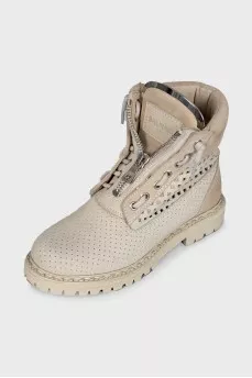 Leather lace-up boots with perforations