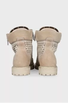 Leather lace-up boots with perforations