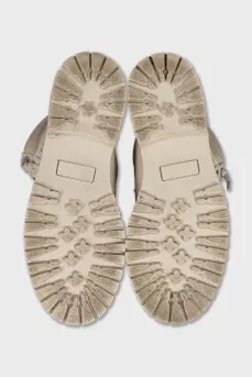 Leather lace-up boots with perforations