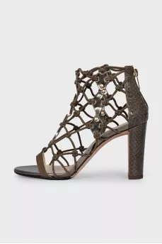 Leather heeled sandals with a braided upper