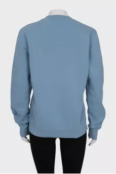 Blue sweatshirt with embroidery