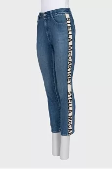 Skinny jeans with a signature logo on the side