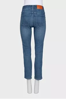 Skinny jeans with a signature logo on the side