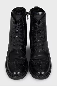 Leather boots with a zipper and perforations