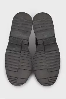 Leather boots with a zipper and perforations