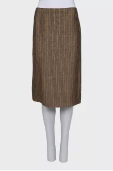 Suit consisting of a jacket with decor and a skirt