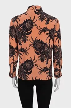 Orange floral print blouse