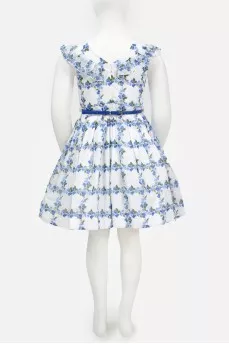 White dress in a blue floral pattern