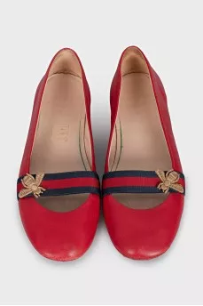 Red ballet flats with textile decor