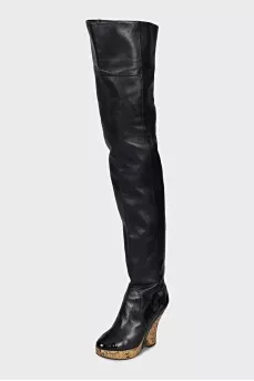 Leather over-the-knee boots with a gold wedge heel