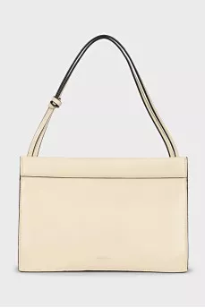 Yellow leather bag with tag