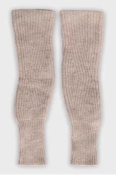 Knitted gloves with a finger hole