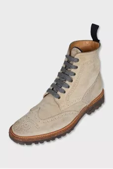 Beige boots with perforations