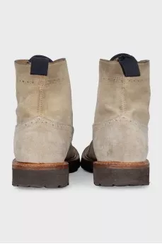 Beige boots with perforations