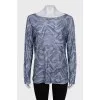 Long sleeve shirt with a print decorated with rhinestones