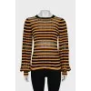 Striped jumper with back fastening