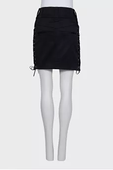 Skirt with lacing on the sides