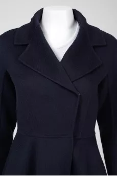 The coat is fitted