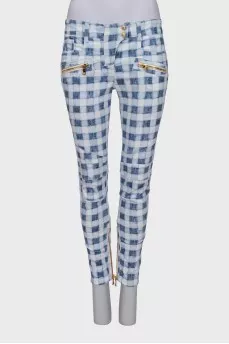 Plaid jeans with gold zippers