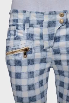 Plaid jeans with gold zippers