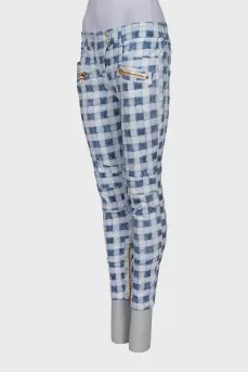 Plaid jeans with gold zippers
