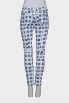 Plaid jeans with gold zippers