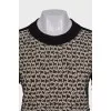 Black dress with a relief pattern