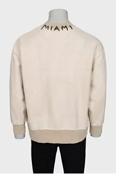 Men's sweater with a printed collar