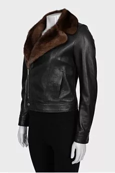 Leather jacket decorated with mink fur