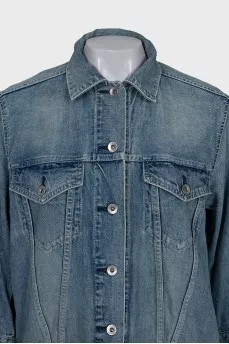 Denim jacket decorated with zippers